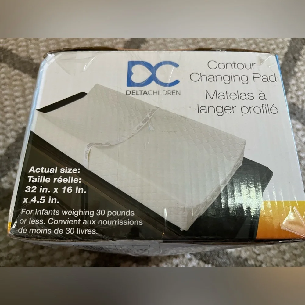 Delta Children Foam Contoured Changing Pad with Waterproof Cover